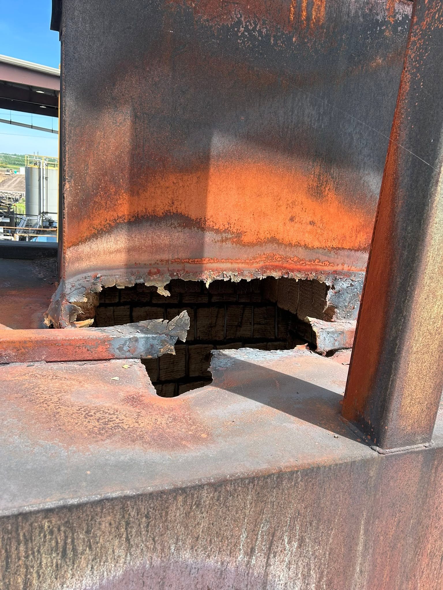 Refractory crew working inside a lined vessel